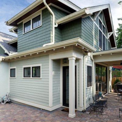 Kitchen and 2nd-floor main suite addition exterior view 